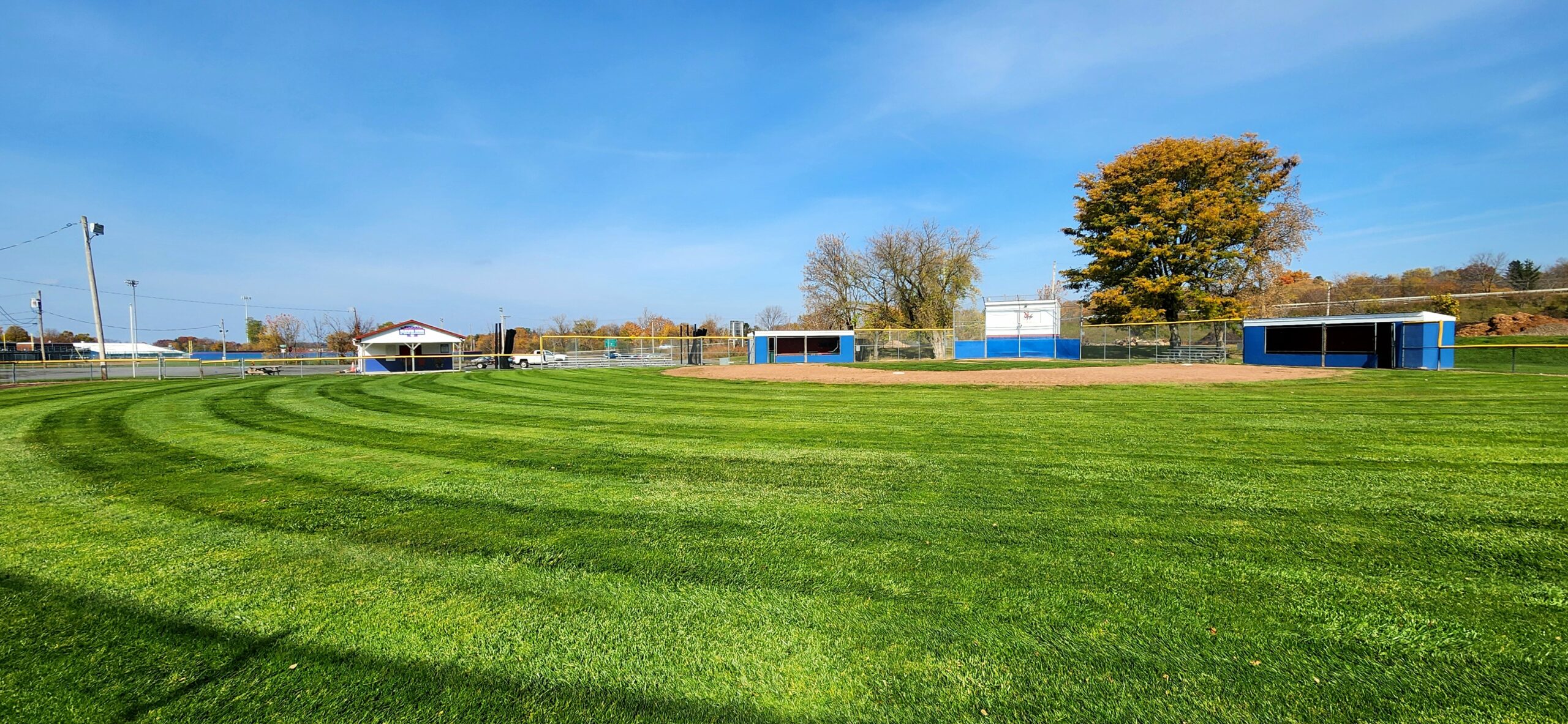 New Hartford Little league baseball field freshly mowed with clean stripes by Turf Pro Outdoor Service in New Hartford, NY